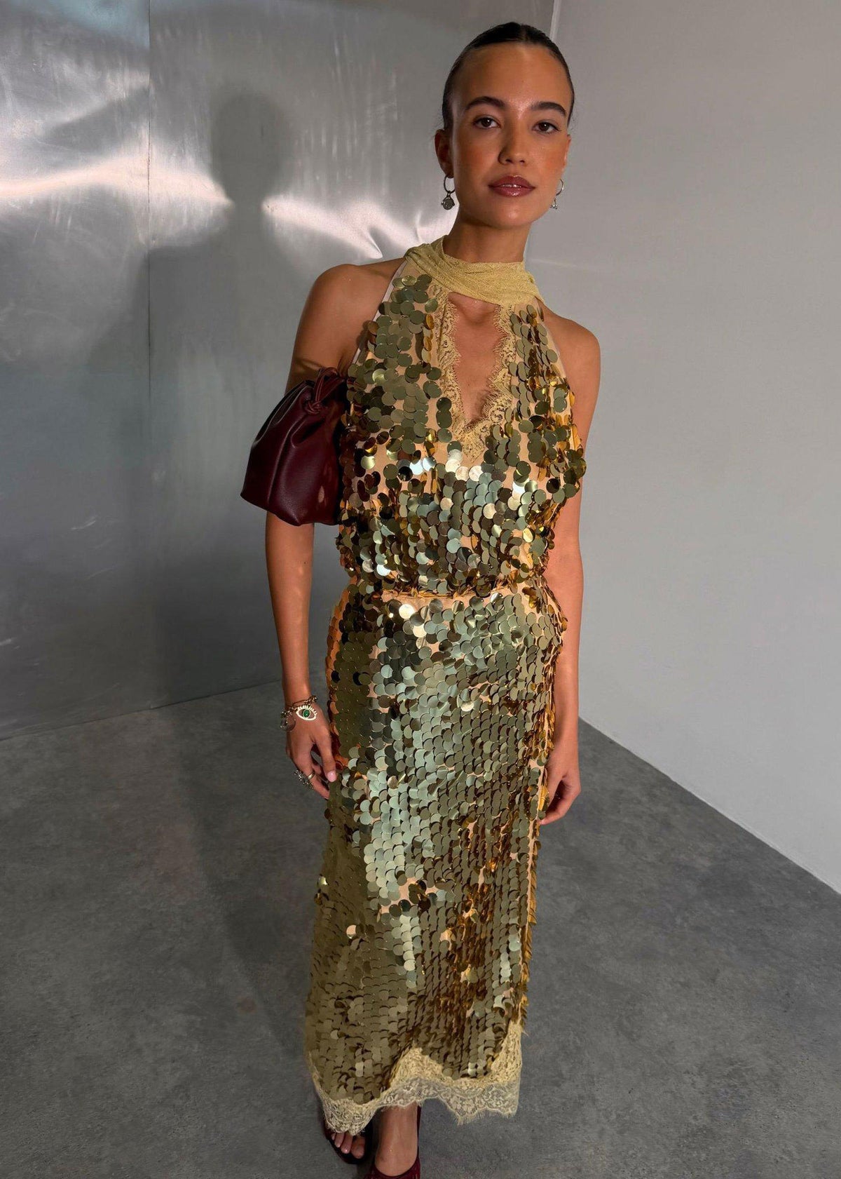 Never Fully Dressed Front view with matching halterneck top and burgundy clutch