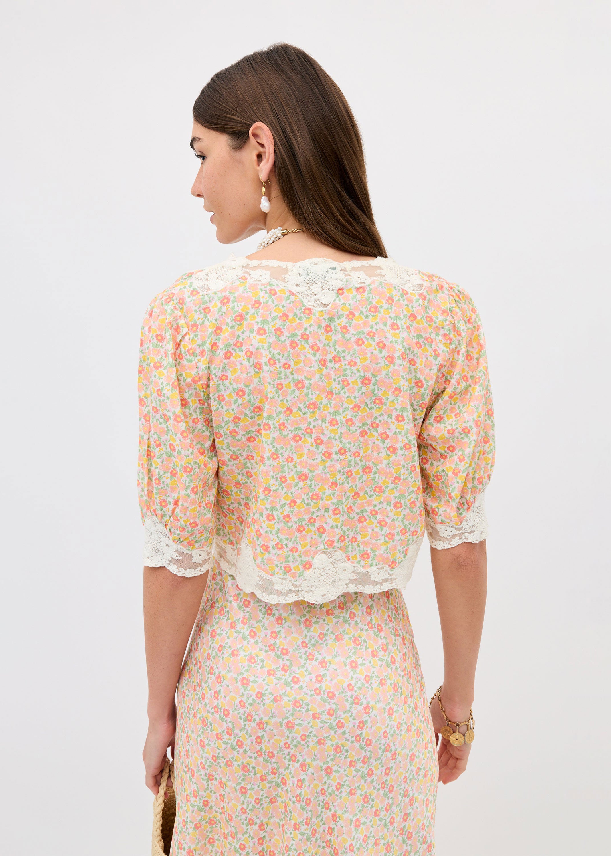 Rixo Back view showing scalloped lace hem and ditsy floral cream print
