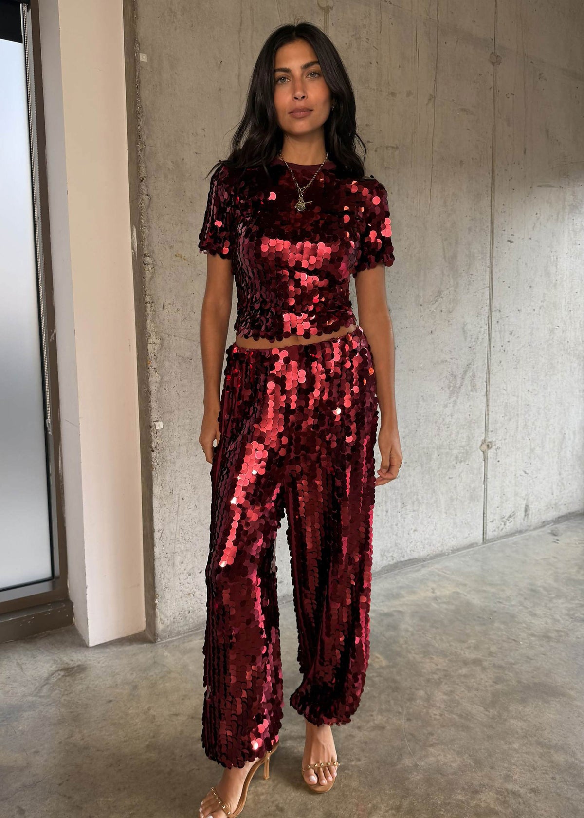 Never Fully Dressed Full length styling with matching sequin trousers and strappy heels