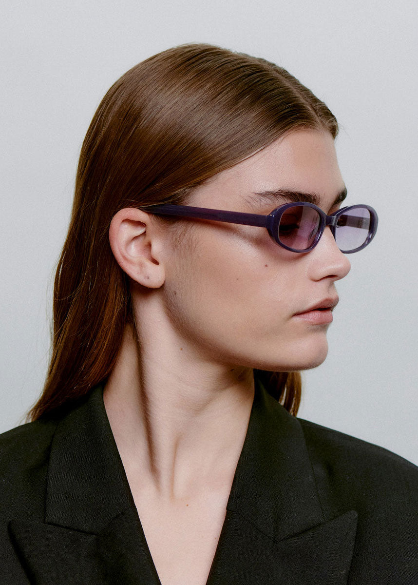 A. Kjaerbede Worn in profile by a model with the lenses on