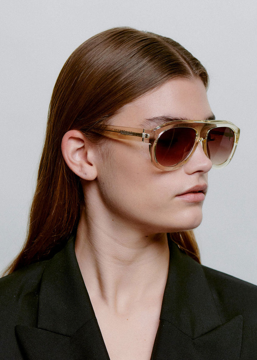 A. Kjaerbede Worn in profile by a model with the lenses on