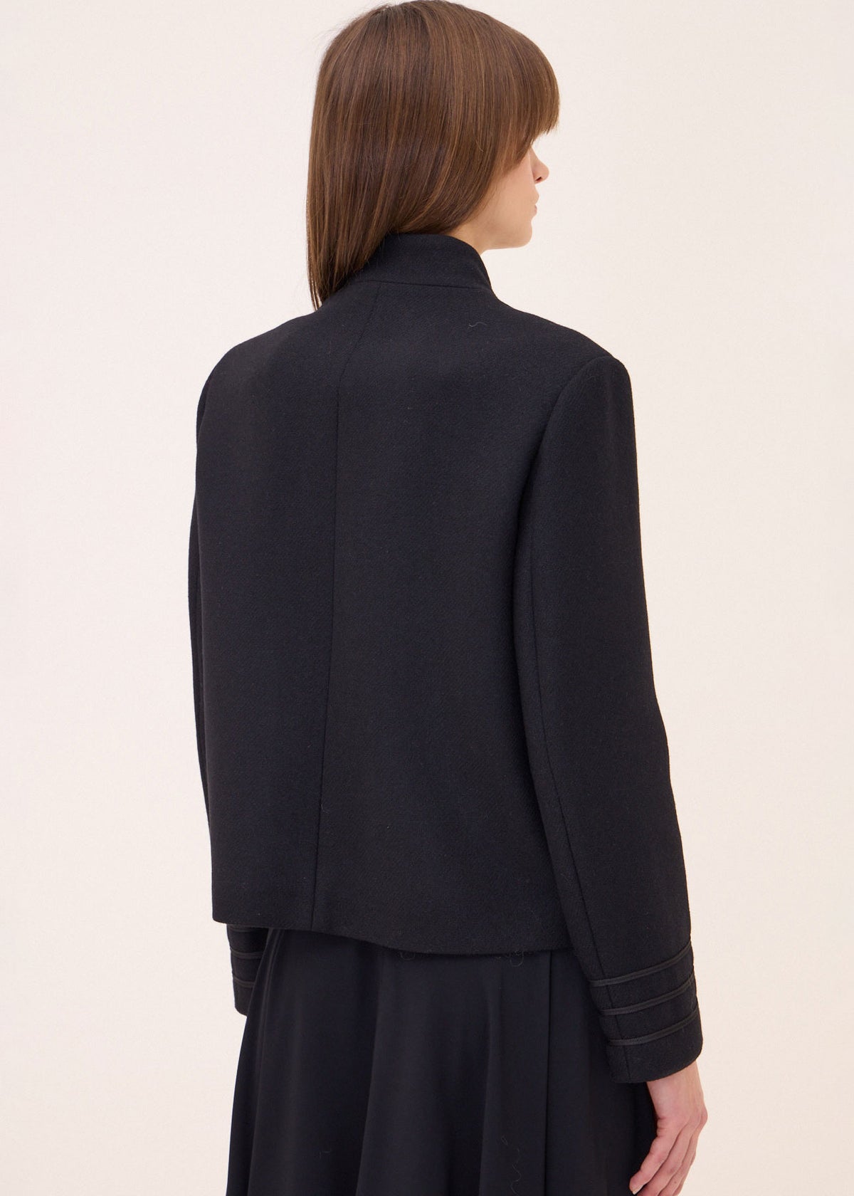 Ottod'Ame Back view, plain stand collar and cropped hem with braided cuff stripes