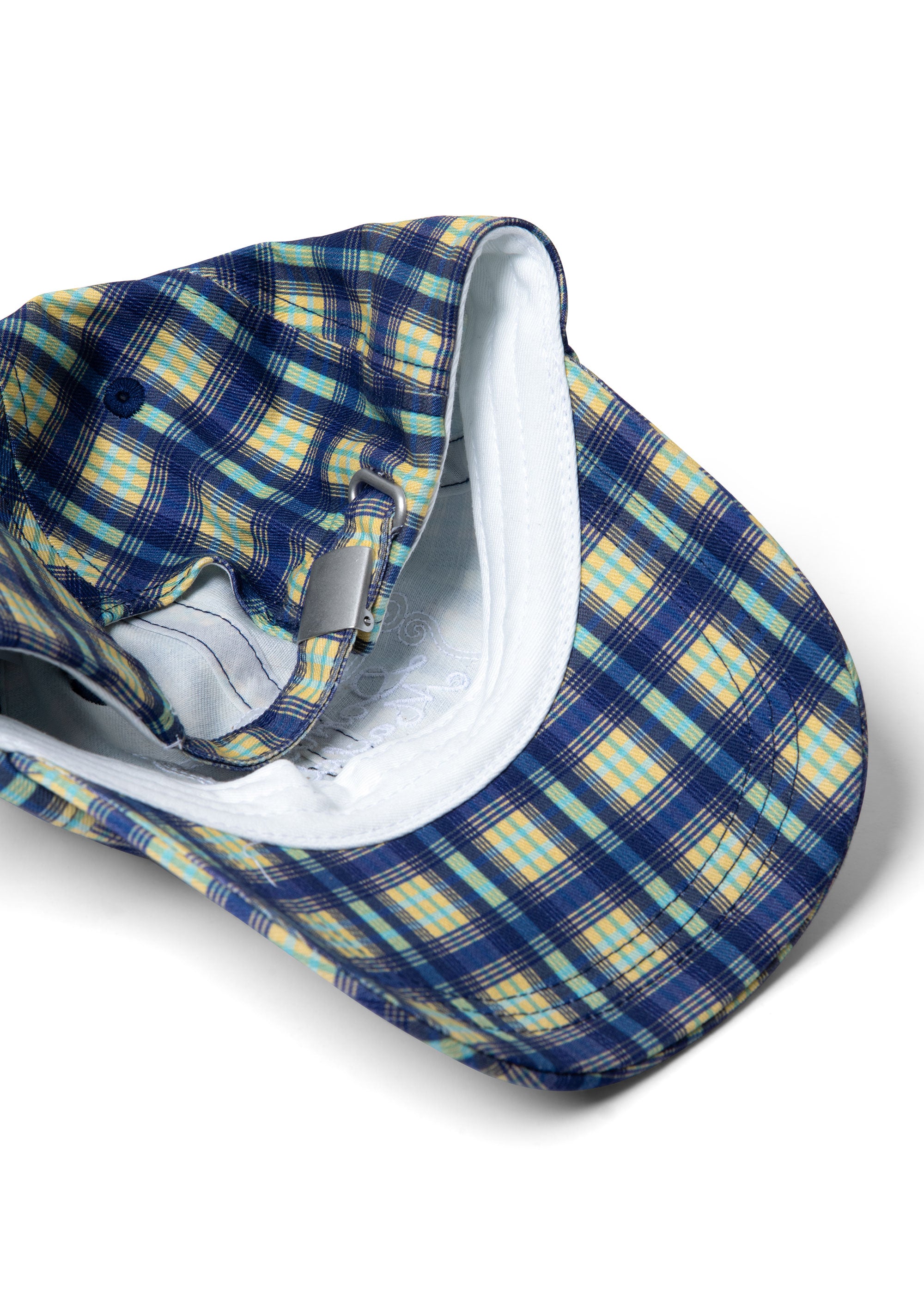Damson Madder Front view, blue tomboy check cap with curved brim