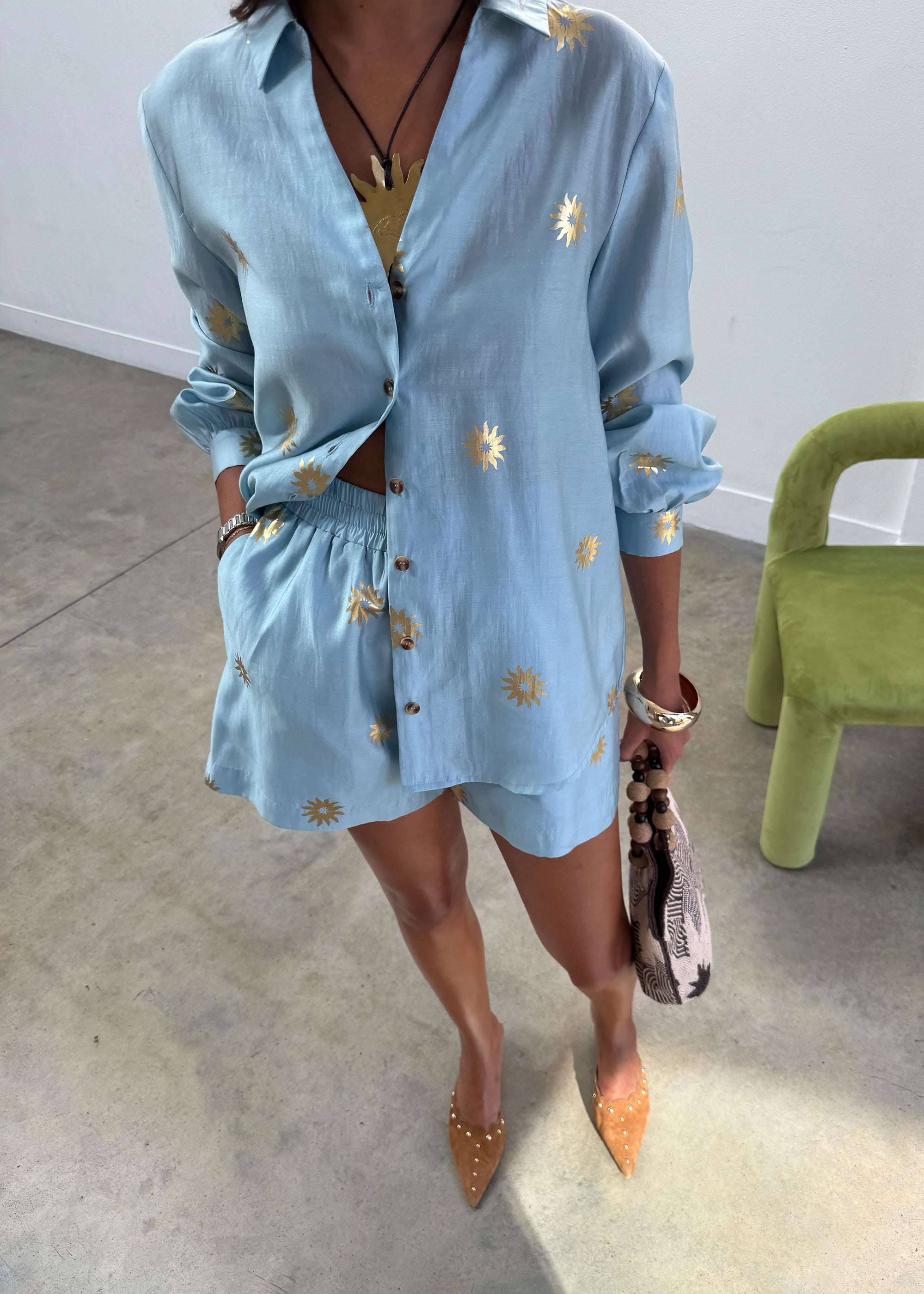 Never Fully Dressed Ice Blue Sun Miley Shirt