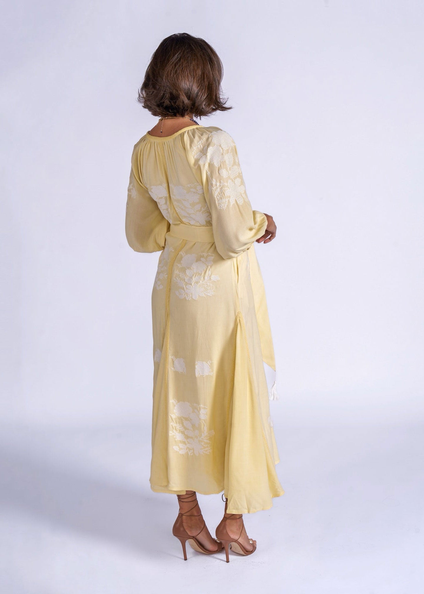 New Day Originals Side three-quarter view, soft draping through the bias-cut skirt panels