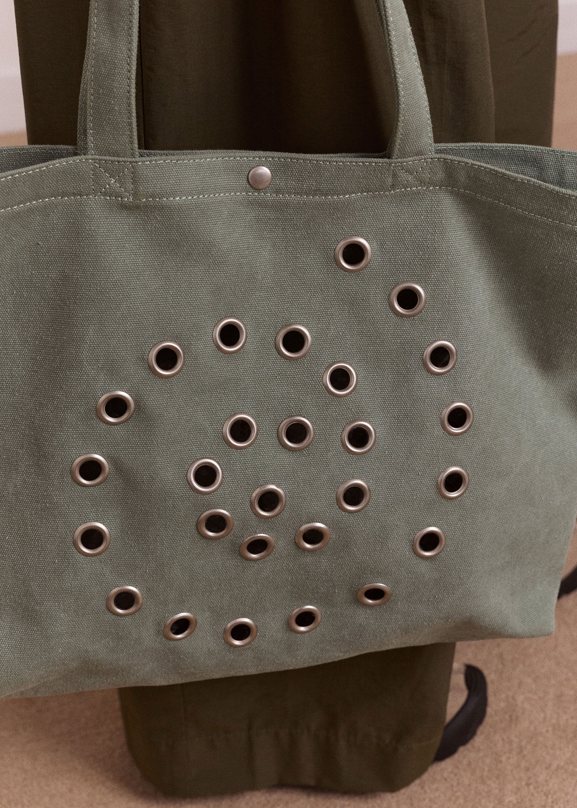 Damson Madder Three-quarter view, mint canvas tote with rolled handles