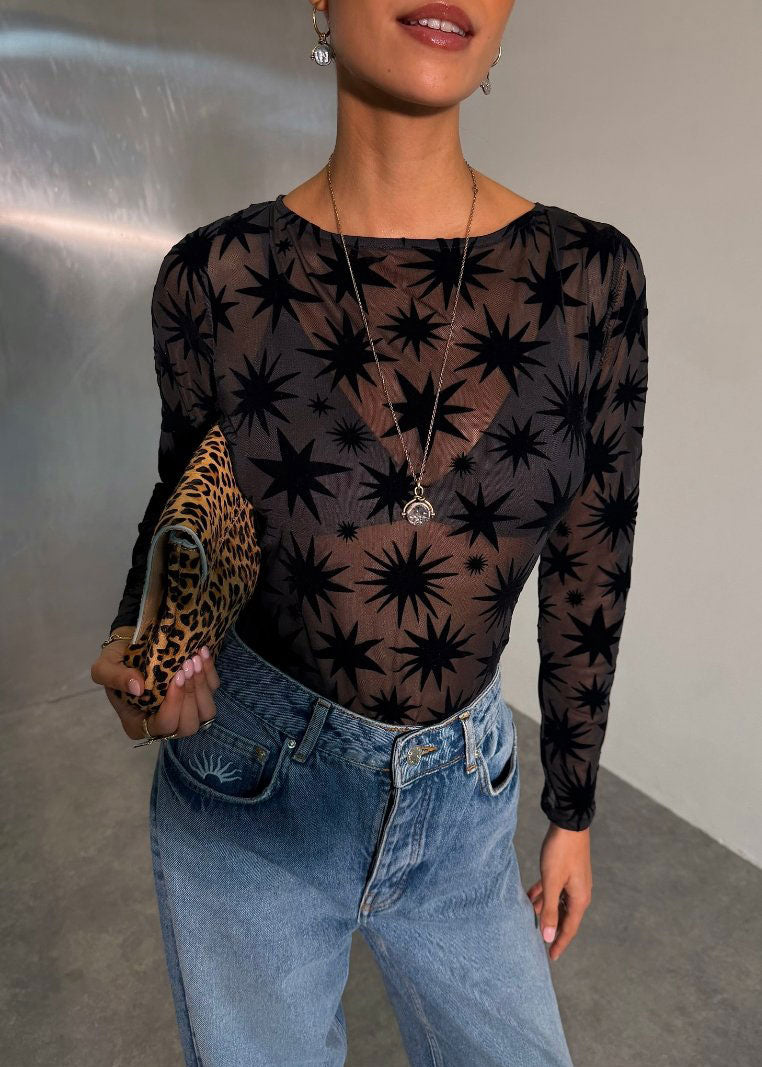 Never Fully Dressed Close front crop with fine pendant necklace and leopard print clutch