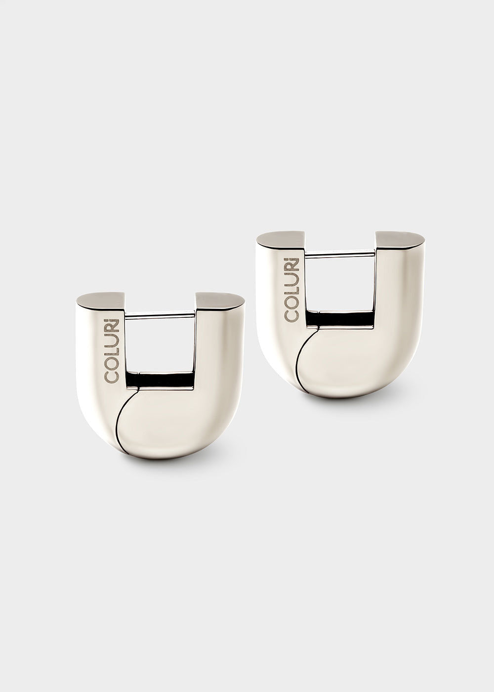 Coluri Coluri Lorde statement earrings in silver, chunky U-shaped hoops with engraved logo
