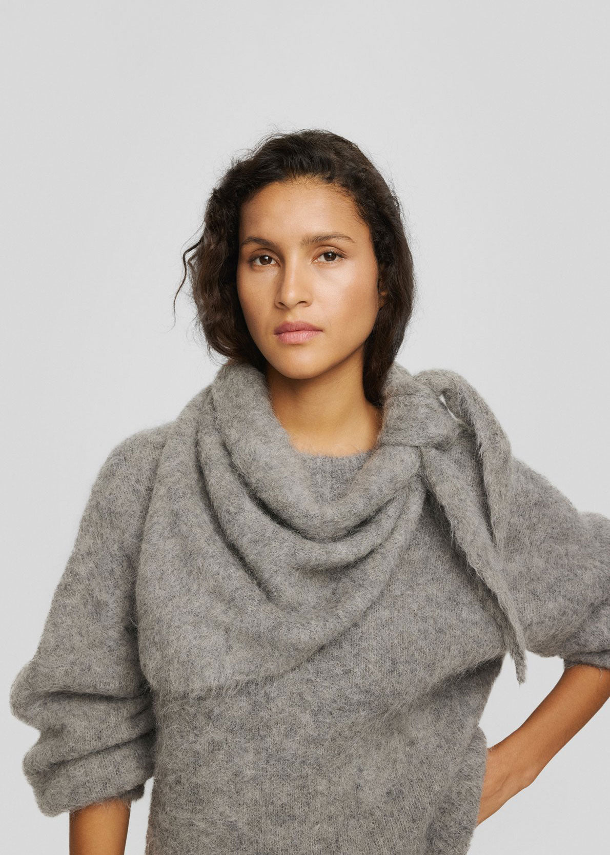 MSCH Copenhagen Draped over the shoulders and tied at the side, worn with a matching grey knit
