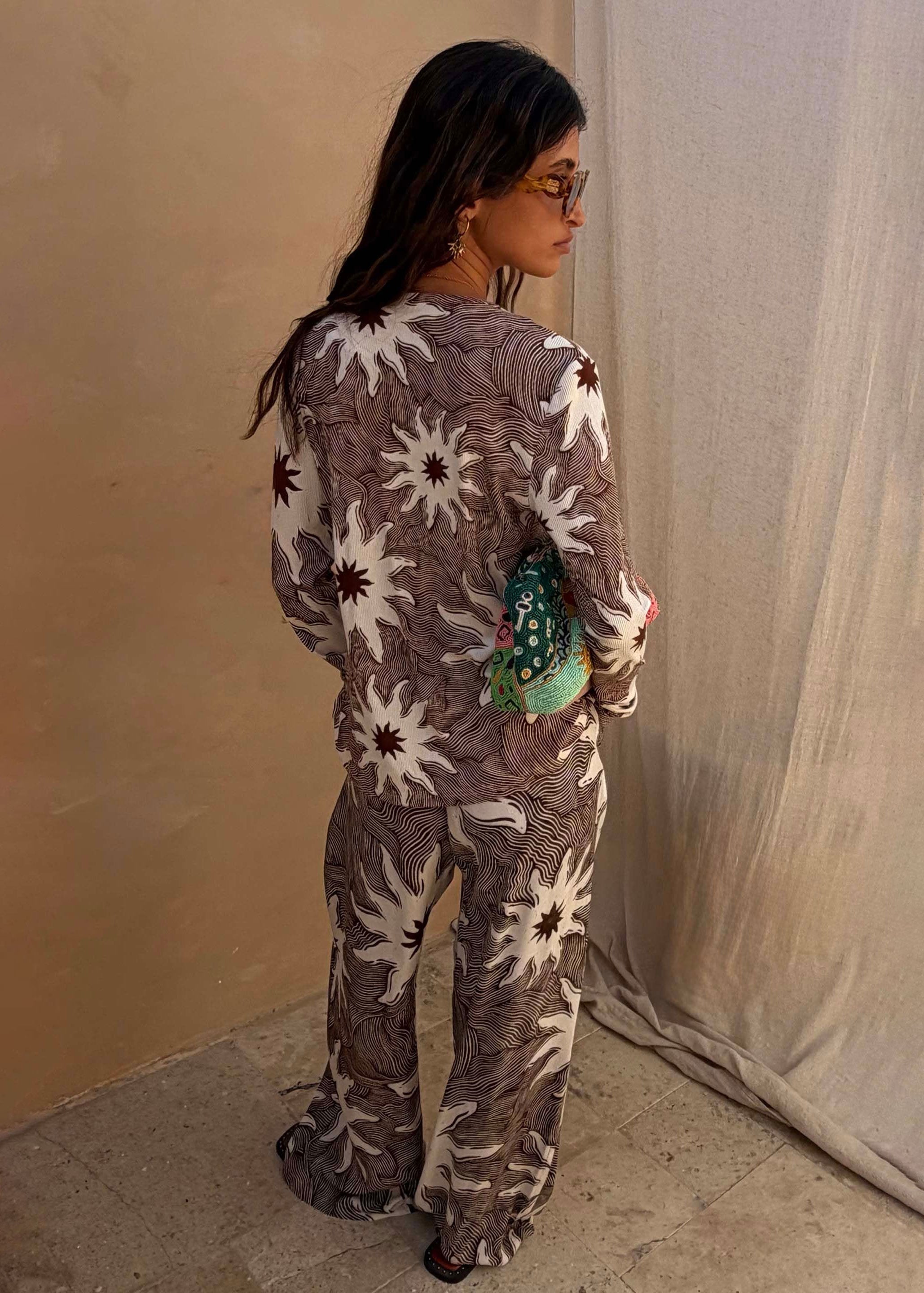 Never Fully Dressed Back view of the wide-leg silhouette in matching shirt co-ord