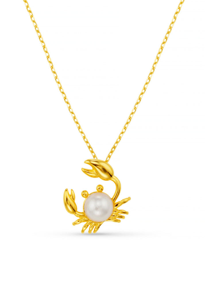 Orelia Orelia Pearl Crab charm necklace, gold chain with a crab and pearl-body pendant