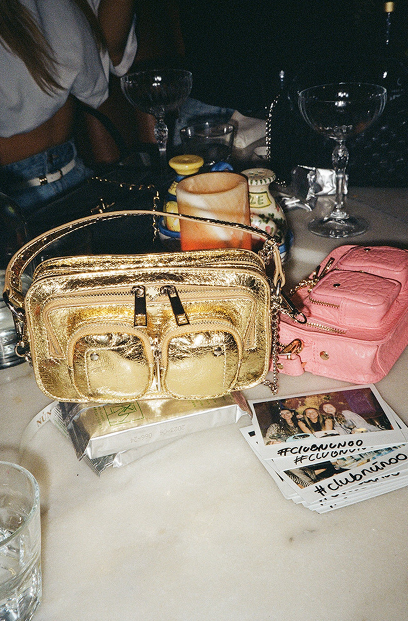 Helena has a large compartment with an inner pocket, and two small pockets located on the front. The bag has silver details. A chain and an adjustable strap for the bag are included. These are removable.