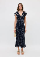 Rixo Bethea midi dress in navy polka dot crepe, lace-trimmed flutter ruffle