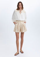 Greek Archaic Kori Flakes high-waist shorts in white with gold diamond embroidery