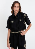 Greek Archaic Kori Lefkada cropped shirt in black linen with gold star embroidery