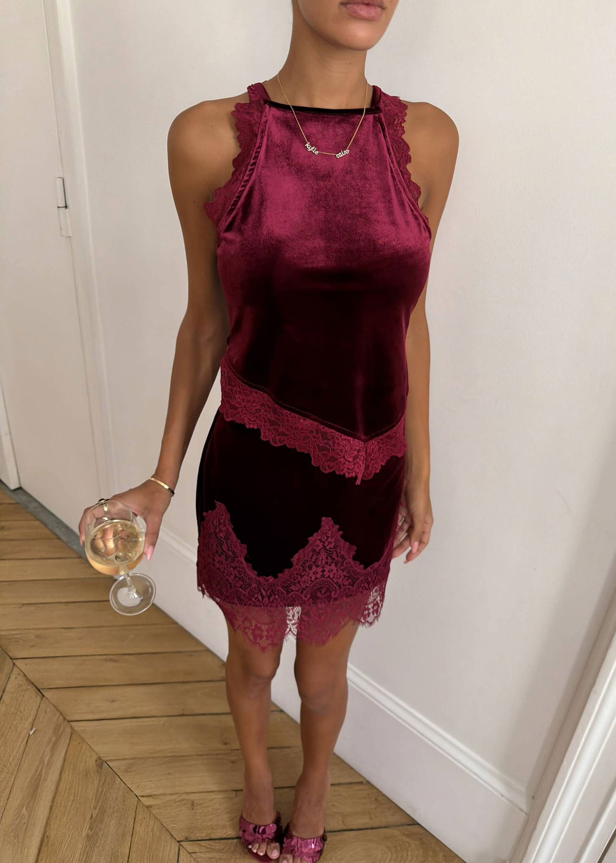 Never Fully Dressed Lace panel at the waist of the velvet top, styled with a matching mini skirt