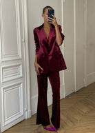 Never Fully Dressed burgundy velvet flared trousers, scattered crystal studs