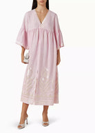 Front view, deep V-neck and side split with gold feather hem embroidery