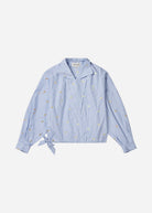 Flat-lay of the blouse, wide collar and full sleeves