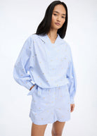 Worn with the matching striped shorts as a co-ord