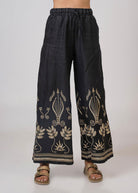 Aether Concept high waist embroidered linen trousers in black with gold lotus motifs