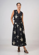 Worn with a matching embroidered wrap top