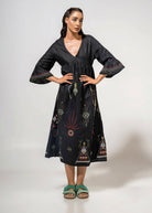 Front view showing V-neck and three-quarter ruffle sleeves