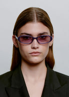 Worn front-on by a model with the lenses on