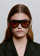 Worn front-on by a model with the lenses on