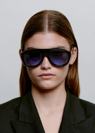 Worn front-on by a model with the lenses on