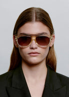 Worn front-on by a model with the lenses on