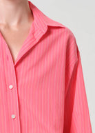 Side view, red stripe Sona shirt with relaxed fit
