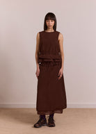 Front studio view, choc Ailani blouse styled untucked