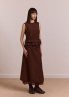 Side view, Ailani choc blouse with panelled seams