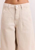 Back pocket with subtle Damson Madder embroidered crest