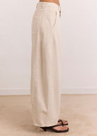 Hand in front pocket, side hip view with the slanted entry