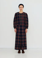 Full-length studio shot, cropped fit with lace trim panels and brown tasselled loafers