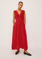 Three-quarter view, deep V ruffle frame and elasticated empire waist