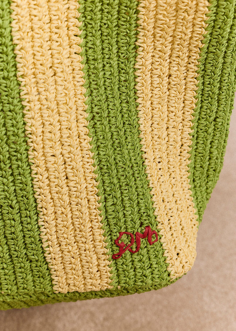 Damson Madder Corner close-up, ribbed base and embroidered logo signature