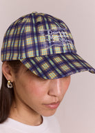 Back view, adjustable strap on the tomboy check cap