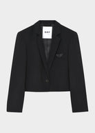 Flat front view with branded lining label and leather-trimmed chest pocket