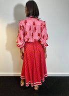 Back view, elasticated waistband and full A-line sweep on the diagonal stripe