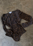 Never Fully Dressed leopard devore bodysuit, brown flocked leopard print mesh with navy spots