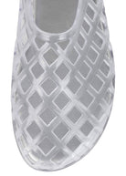 Close-up of the perforated upper showing the diamond lattice