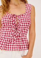 Close-up of the ladder-tie front and crinkled gingham weave