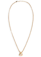 Full length view of the rolo chain laid flat with pendant centred