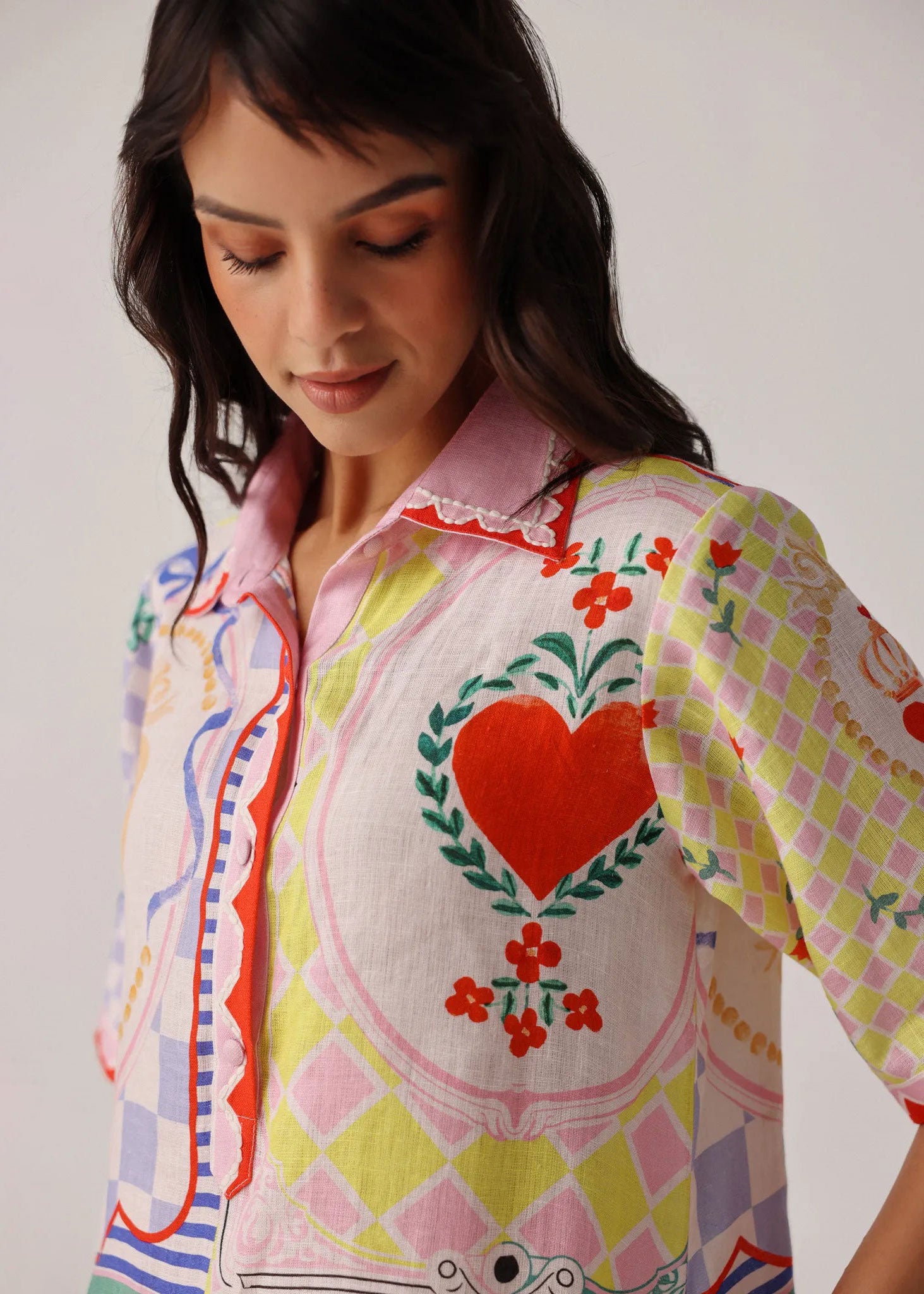 NOIB Bodice close-up showing heart and clover motif on checkerboard ground