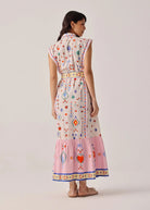 Back view with cap sleeves and pink gathered tiered hem panel