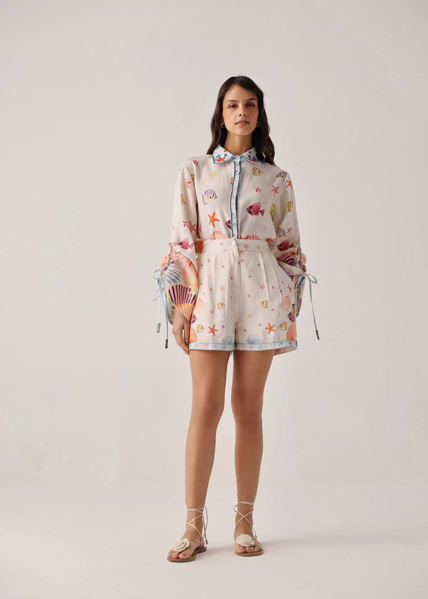 NOIB Full-length studio view paired with the seaborn shell-print shirt