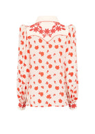 Back view, embroidered yoke and gathered blouson sleeves on rose-print silk
